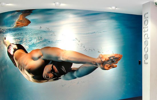 sutherland leisure centre wallpaper with male swimmer diving under water