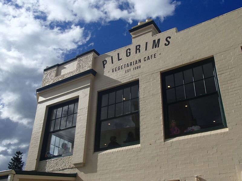 close up of Pilgrims Cronulla logo on building